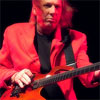 Read "Adrian Belew: Power Trios and Crimson Heads" reviewed by 